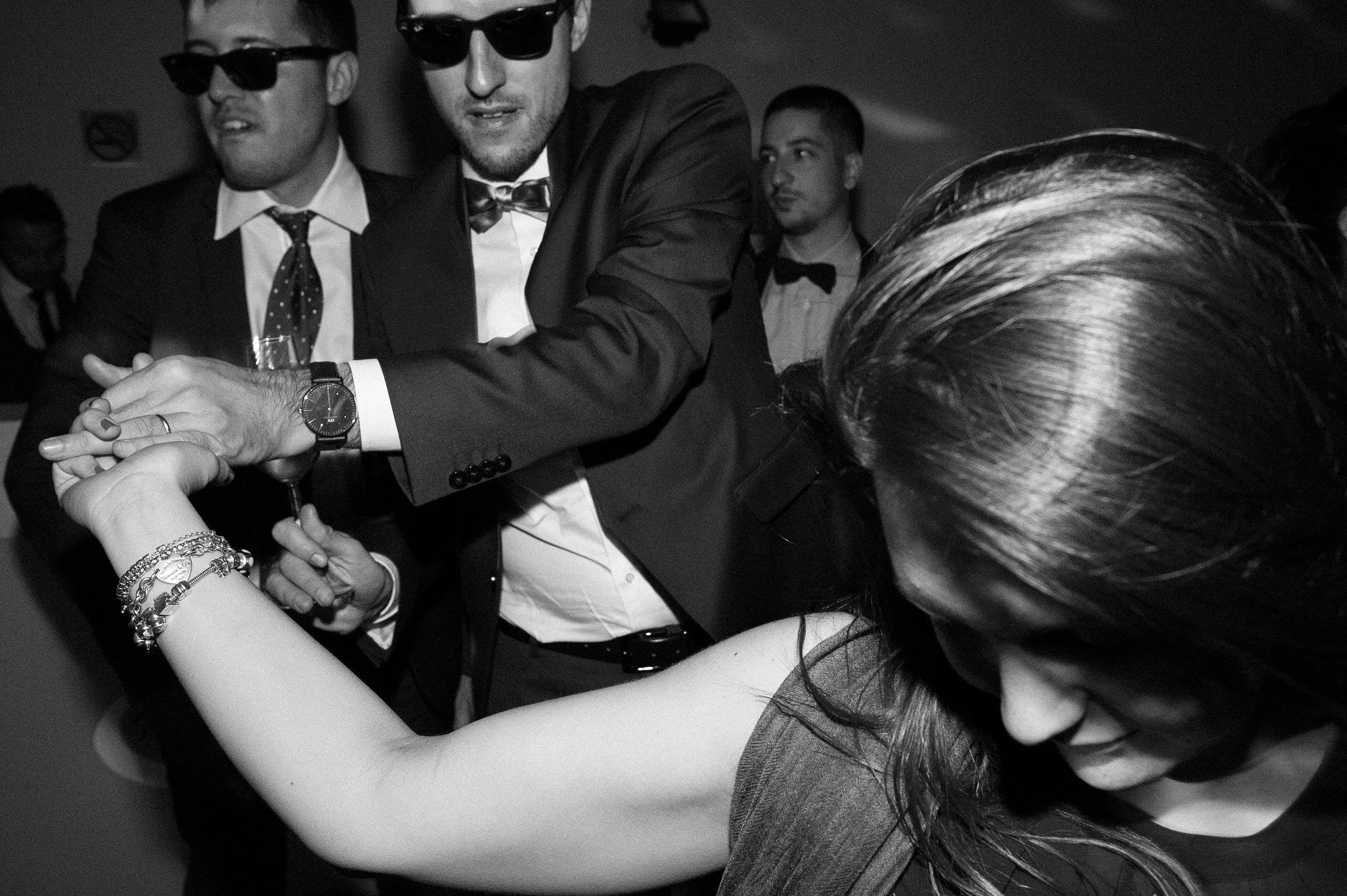 reception dancing in black and white by the guests black and white wedding photography