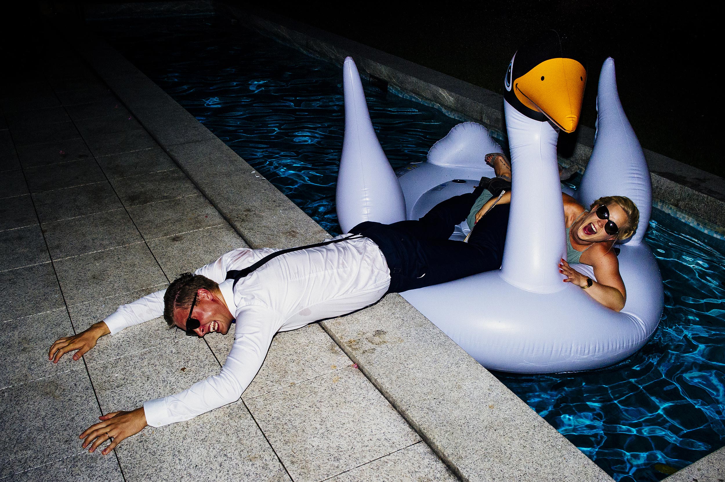 crazy pool party wedding inflatable duck in lake como by Alessandro Avenali italian photographer