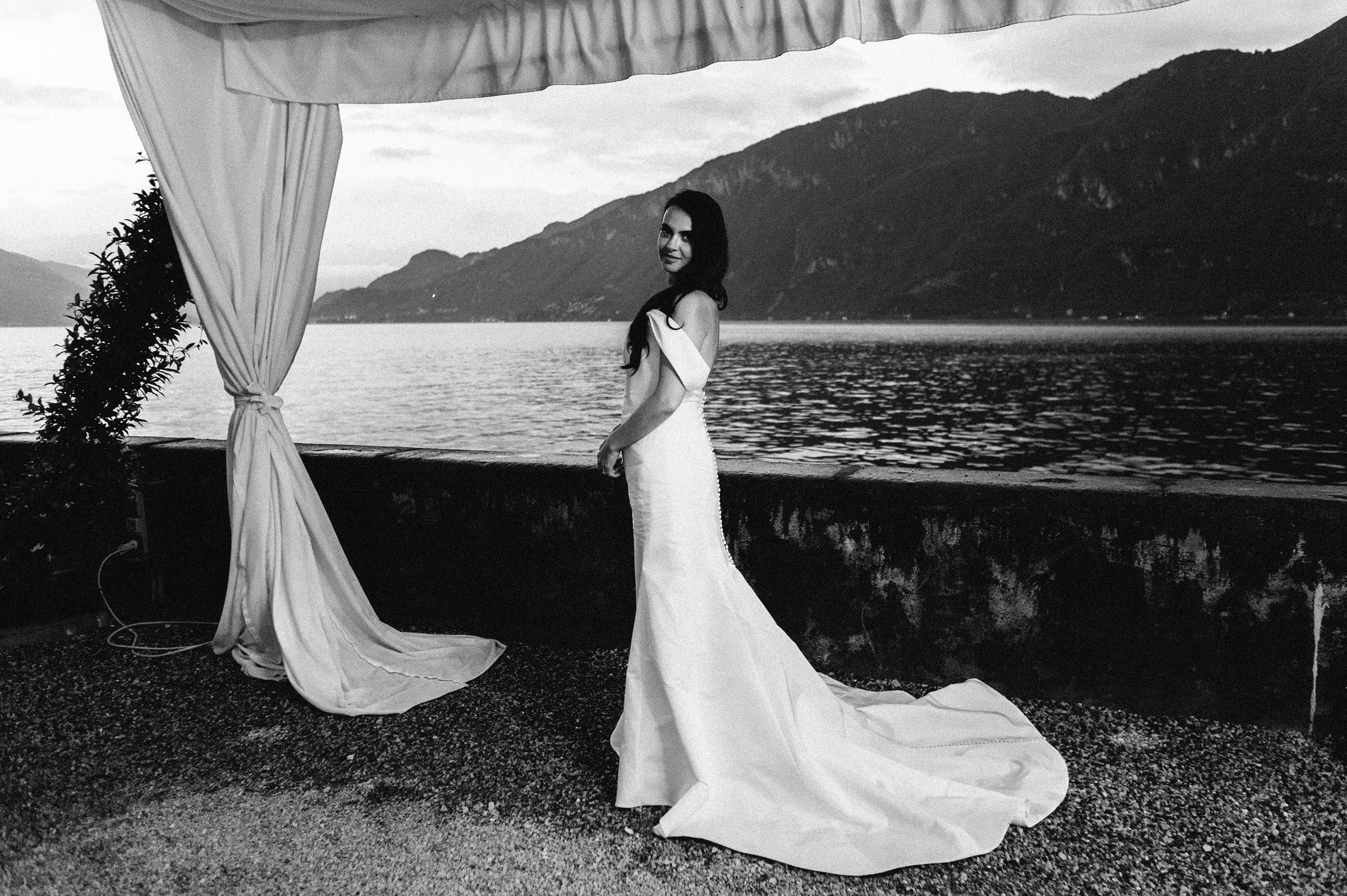 portrait of the bride and curtain lake como black and white wedding photography